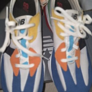 New Balance White Sneakers with Blue, Orange, Yellow Accents